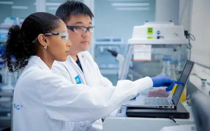 Bioscientist looking at a computer screen