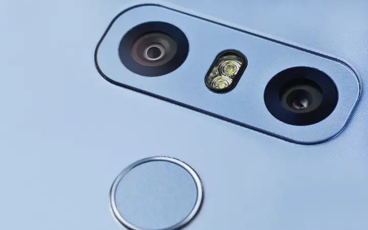 Close up of a smartphone camera aperture