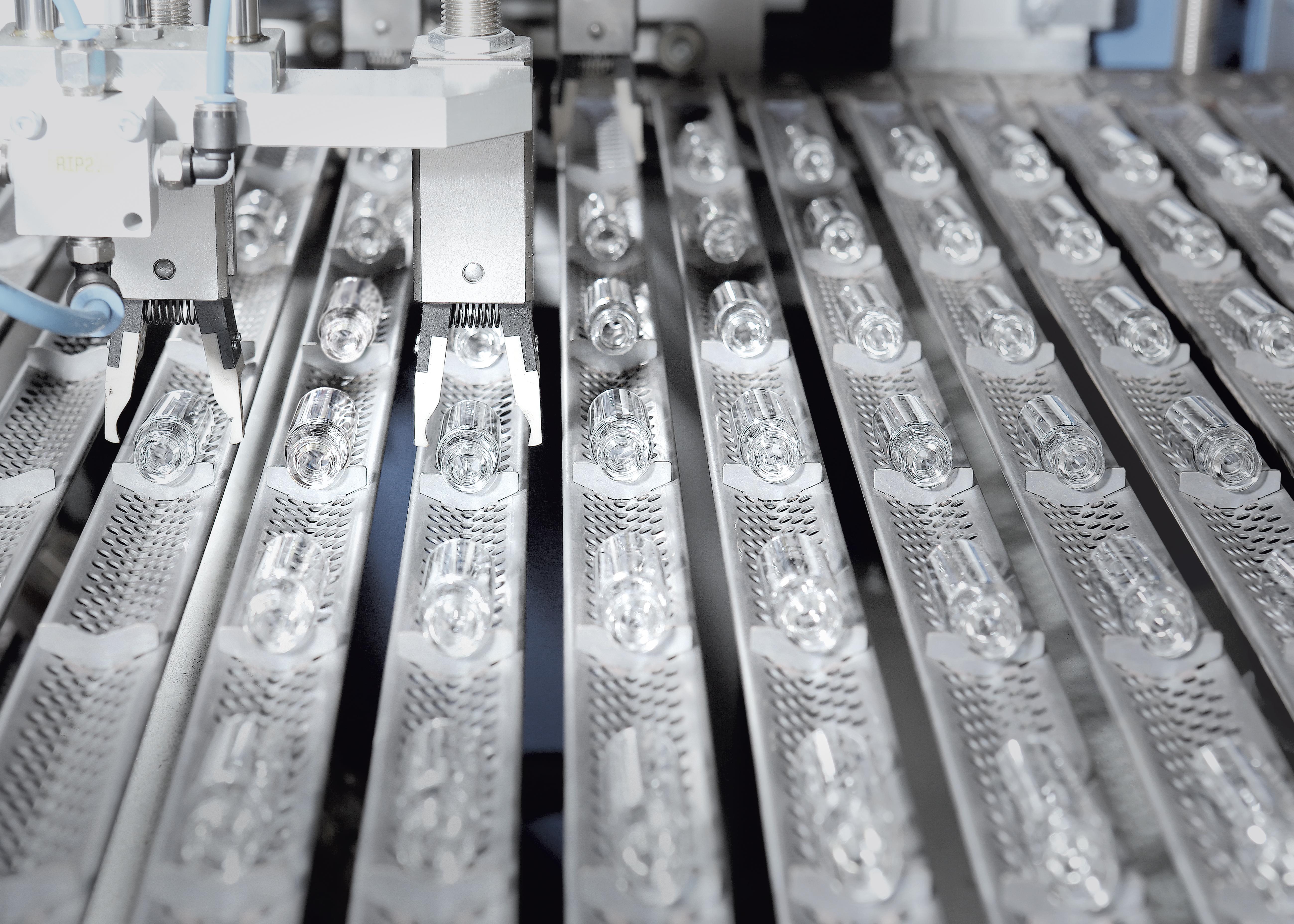 SCHOTT pharmaceutical glass manufacturing equipment producing glass vials
