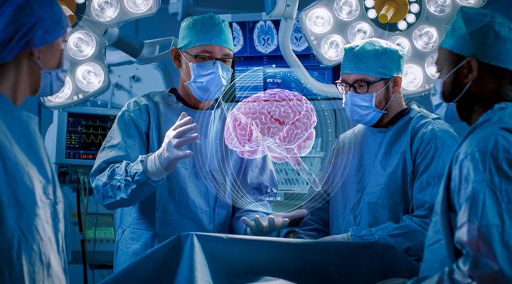 Doctors with AR glasses are looking at a projection of a human brain