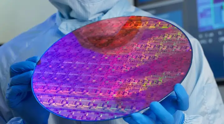 Nanostructured wafer with replicated optical patterns created through nanoimprint lithography