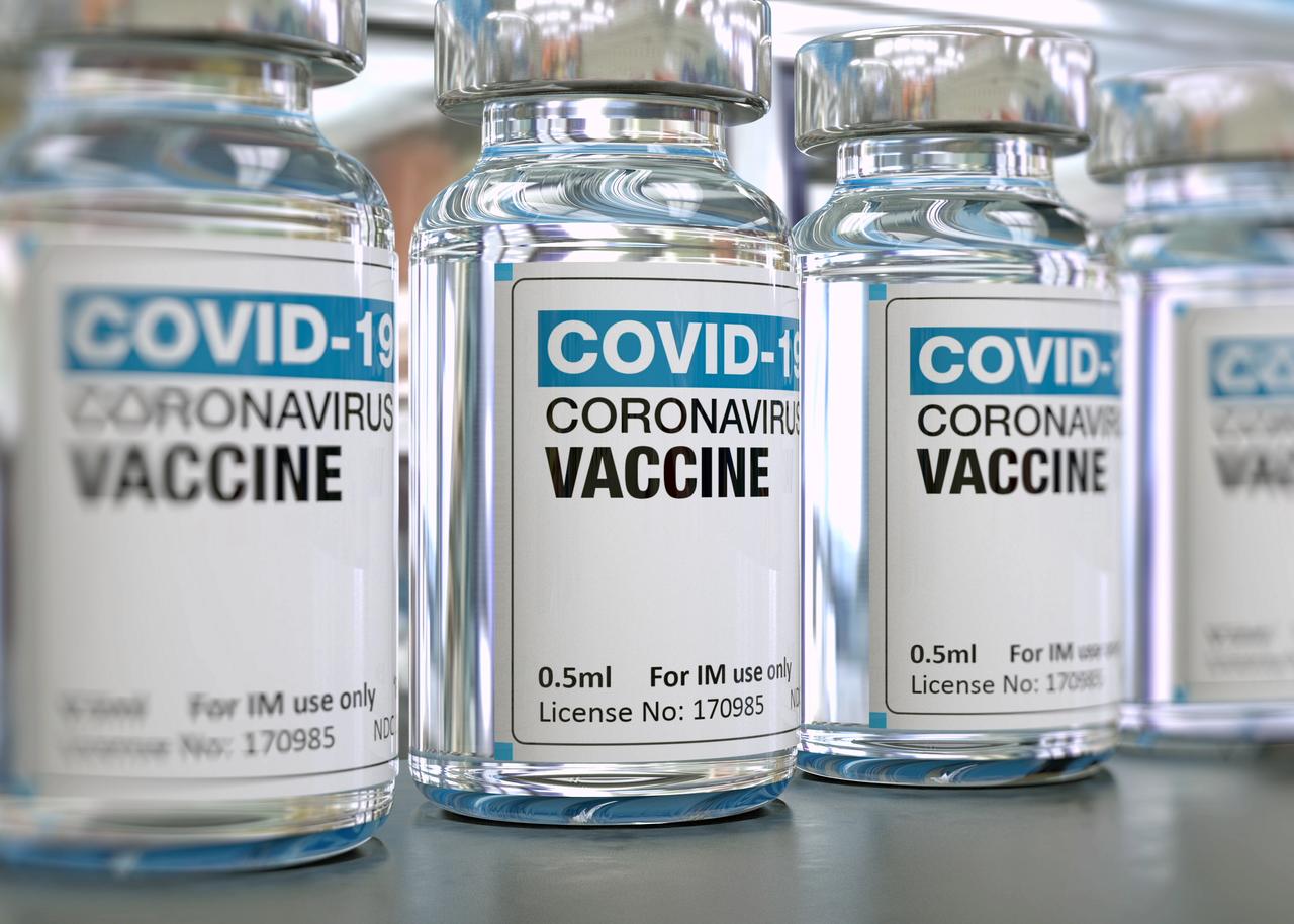 Covid-19 vaccine vials on isolated background