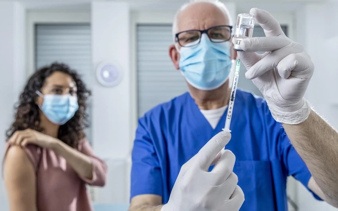 Woman and man while medication injection