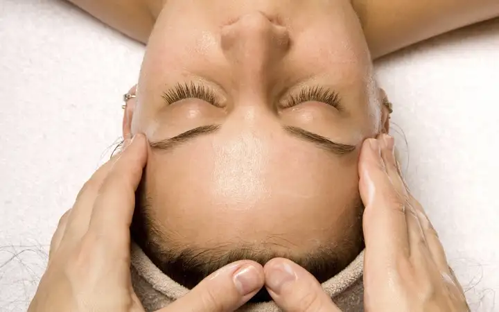 Female being given a head massage