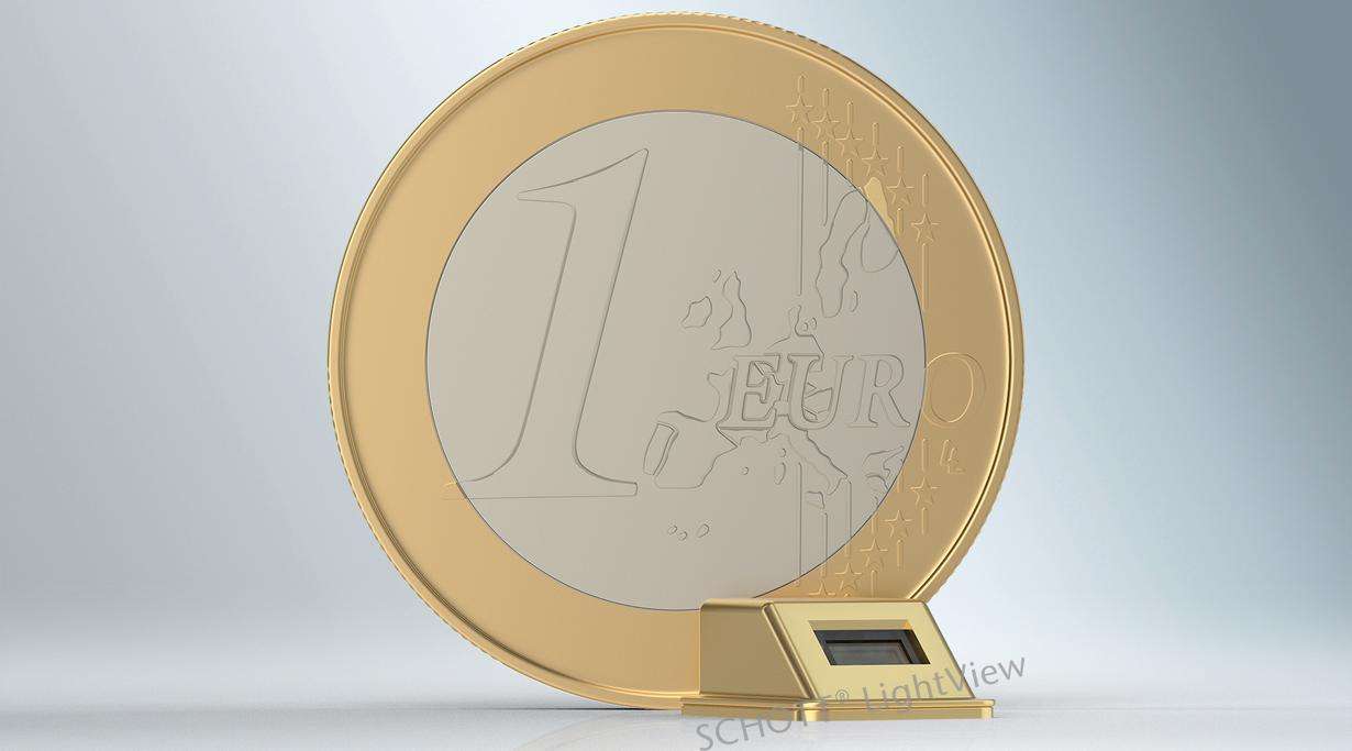 Miniaturized laser packaging component together with one euro coin