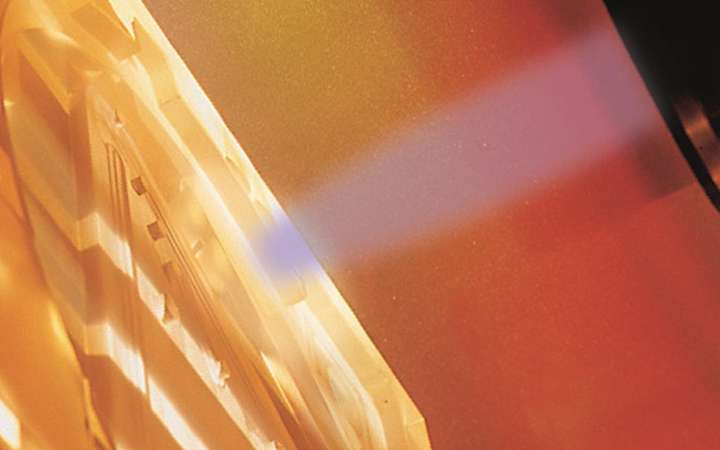 Illustration of light being focused on a component in lithography process