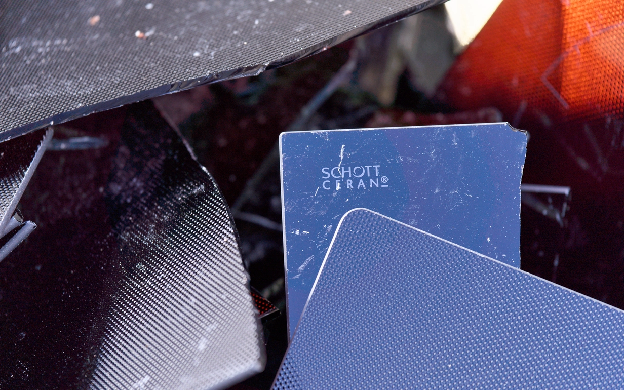 Discarded glass ceramic hobs for recycling.