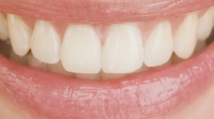 Close up of a female mouth smiling showing teeth