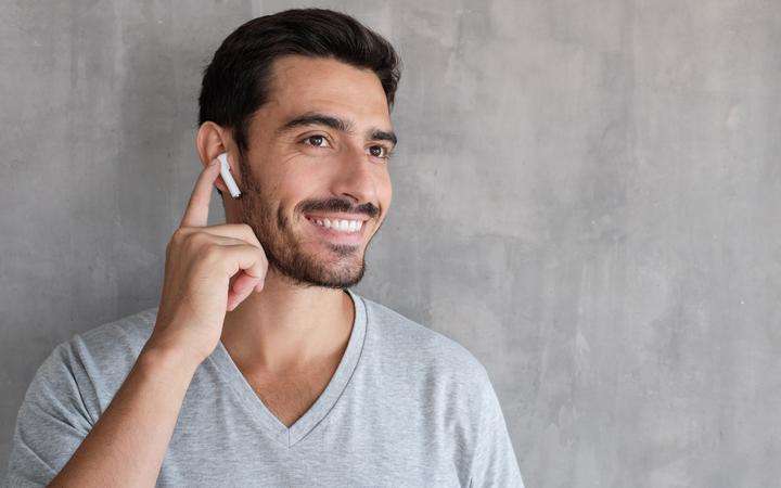 Man with earbuds