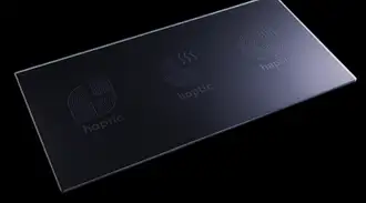 Black glass panel with integrated haptic printing effects 