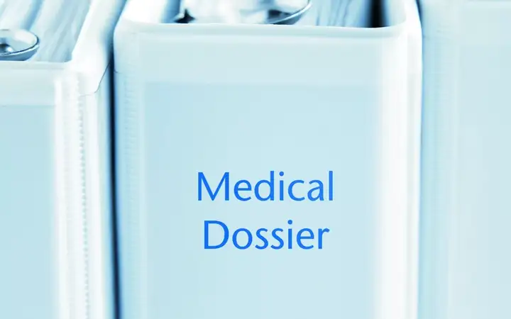 White folder with the words Medical Dossier