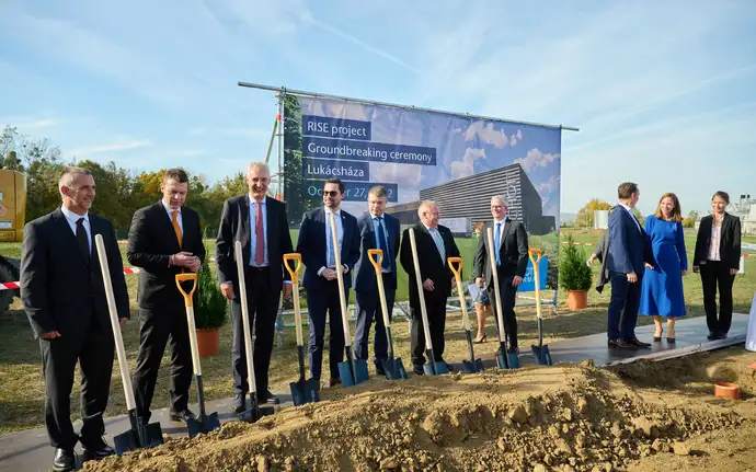 Men at the groundbreaking ceremony