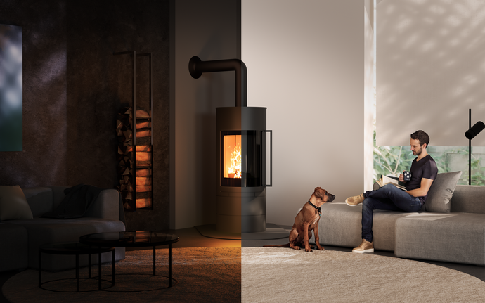 Black fireplace with ROBAX NightFlame® with a blazing flame. Man sitting on the couch reading, dog sitting in front of him.