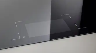 Black SCHOTT CERAN® cooktop with the TFT display switched off and nearly invisible.