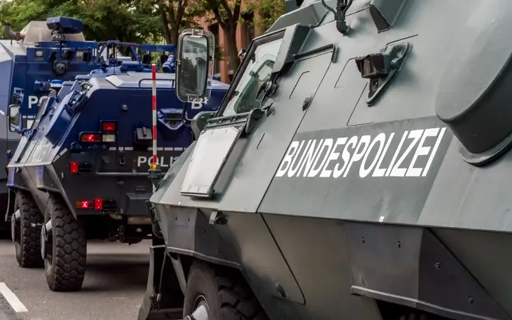 A row of armoured vehicles of the German federal police