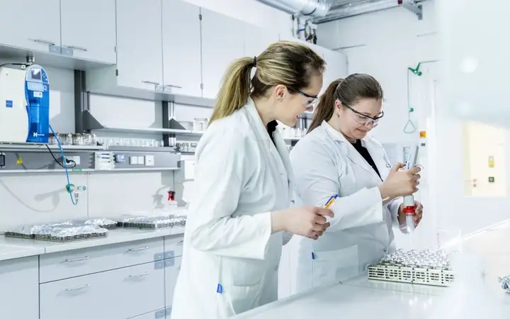 Two female scientists working in a laboratory