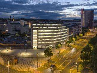 Aerial nighttime view of the Schocken department store in Chemnitz, Germany