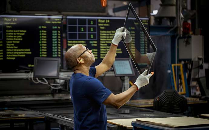 Man checks an oven glass door