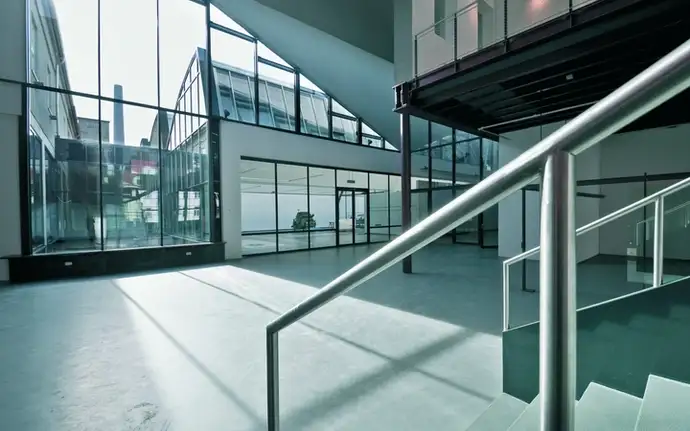 Bright reception area of an office building with glass wall