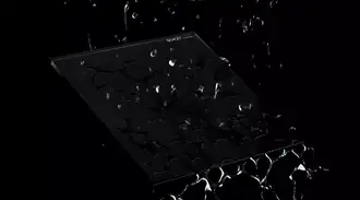 Water droplets on a glass surface showcasing coating with hydrophobic properties.