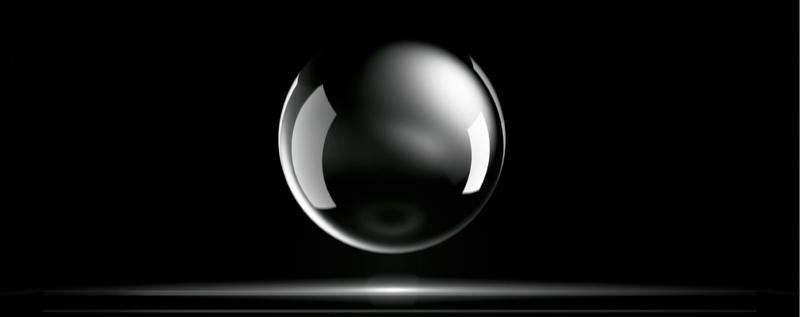 	Floating glass ball in a dark room as a symbol of the distinction between glass and CERAN®