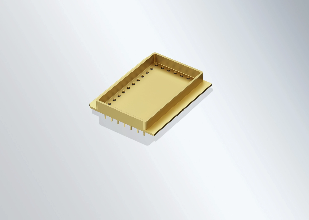 Golden microelectronic housing with light grey background