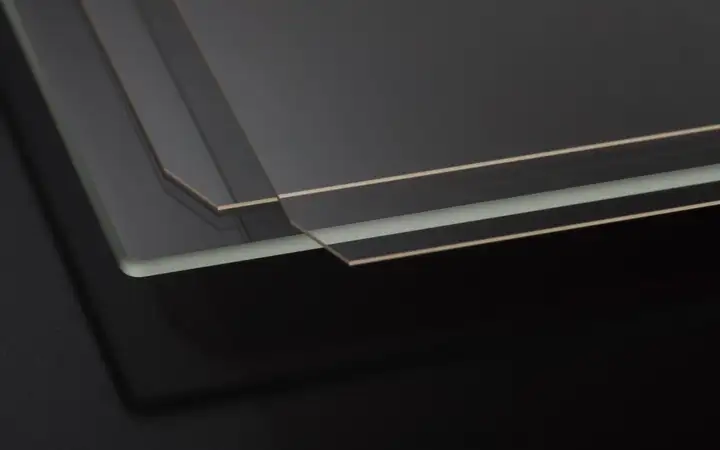 A range of transparent SCHOTT Glass Panels on dark background