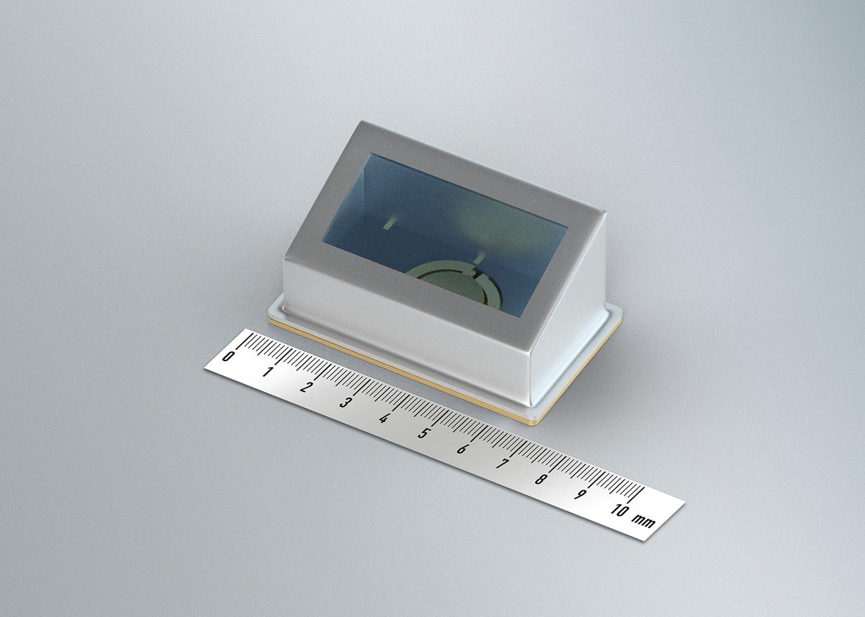 SCHOTT® LightView angled window package for MEMS mirror next to small ruler