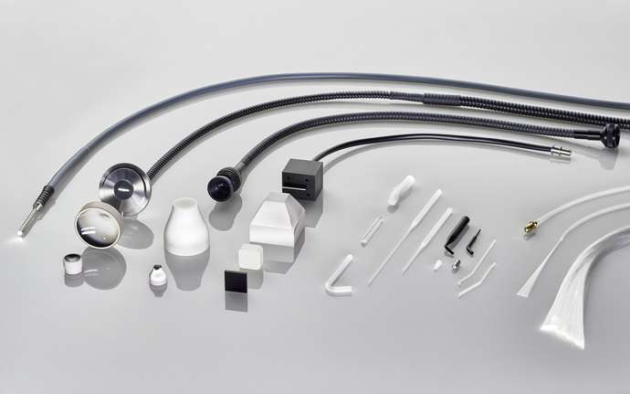 An array of flexible and rigid fiber optic guides