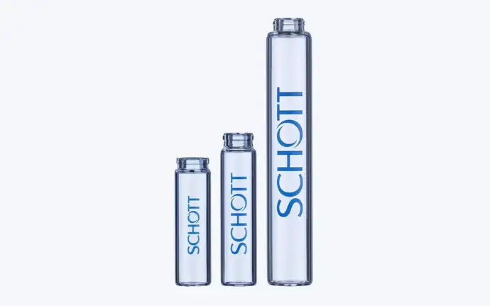 Three glass vials of different sizes with SCHOTT printed on them
