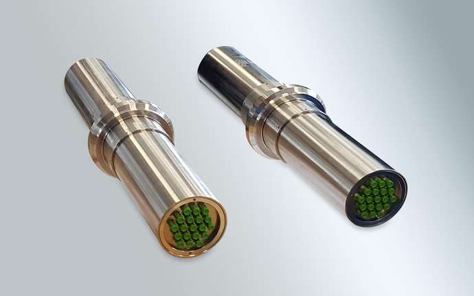 Two glass-sealed feedthrough components.