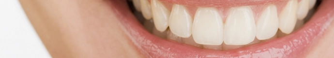 Close up of a female mouth smiling showing teeth