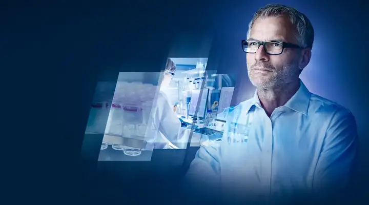  Man with glasses in front of images of a scientist and a row of pharmaceutical vials