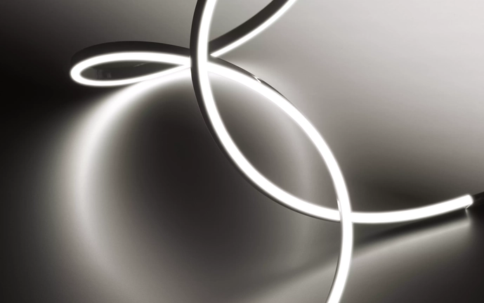 Abstract light sculpture with curved glowing tubes