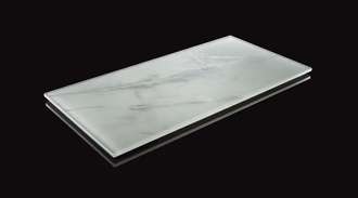 Samples of SCHOTT glass printed with different natural effects