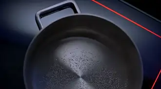 Close-up of a pan on top of a CERAN HIGHTRANS® eco S glass-ceramic cooktop