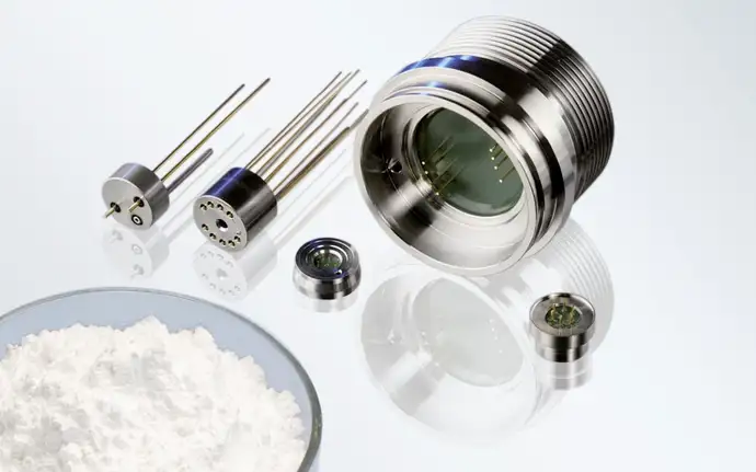 A plate of glass powder and glass sealed connectors and packages