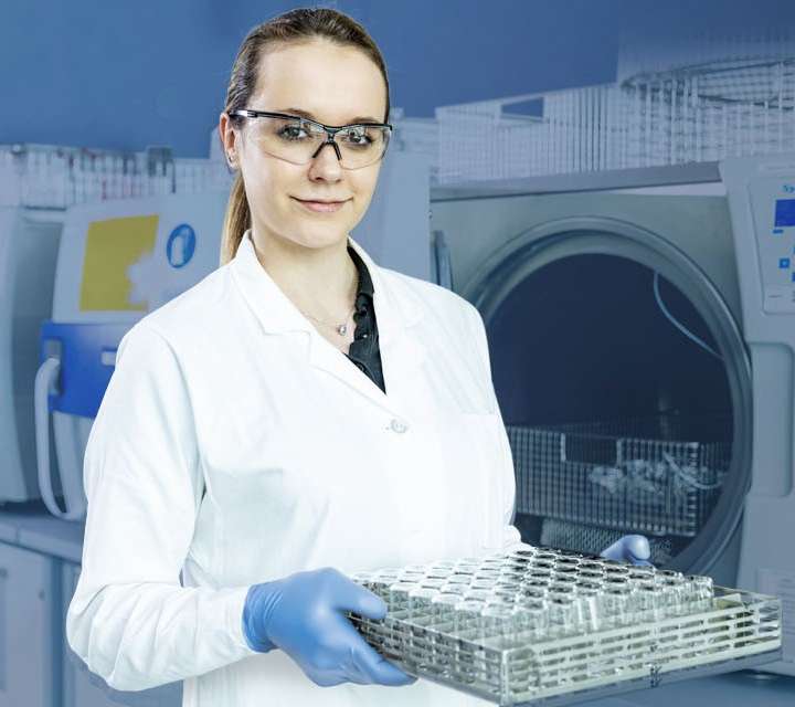 Woman in a lab coat in the laboratory