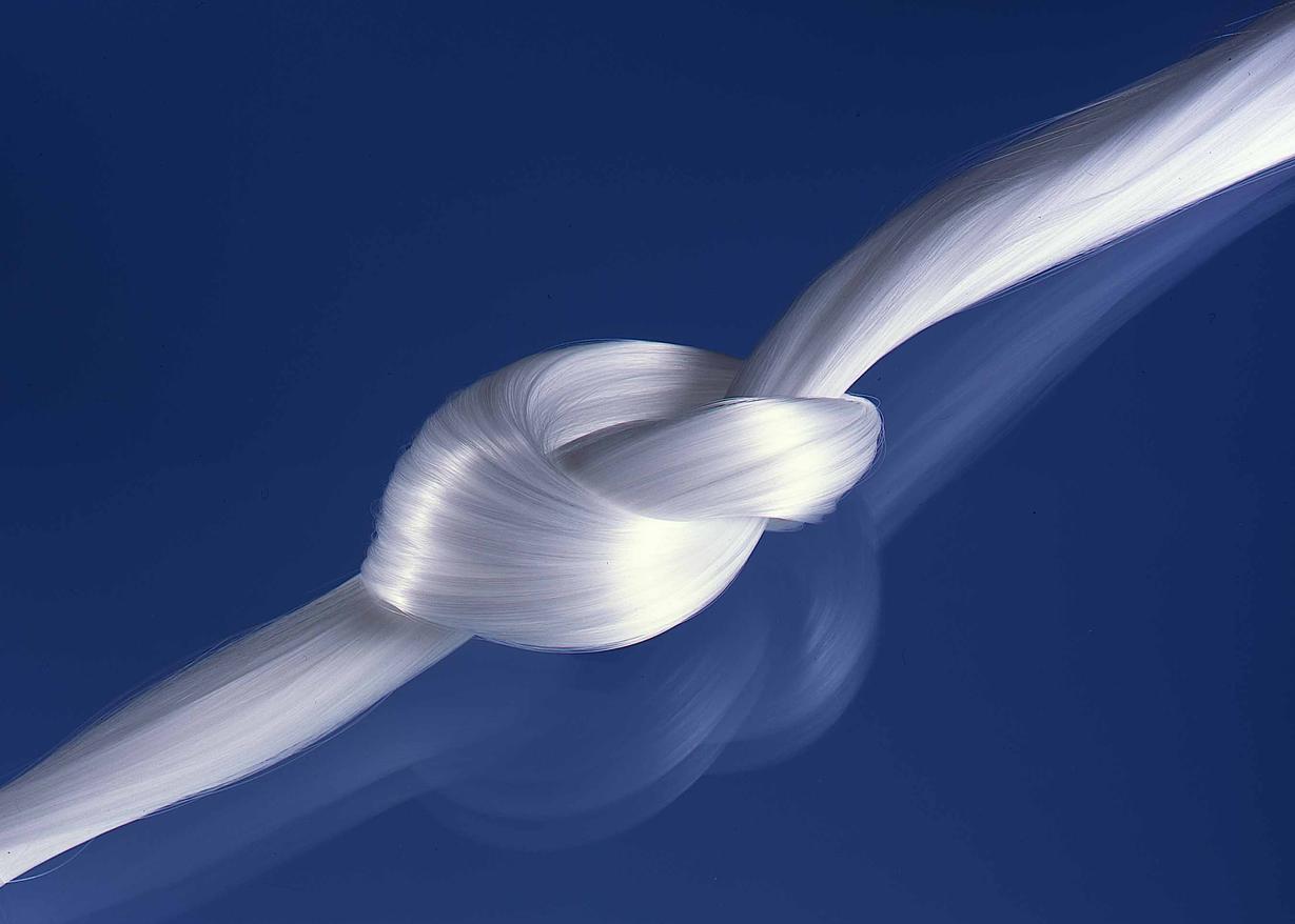 Glass optical fiber bundle tied in a knot