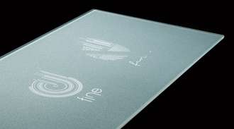 Samples of SCHOTT glass printed with fine lines and symbols