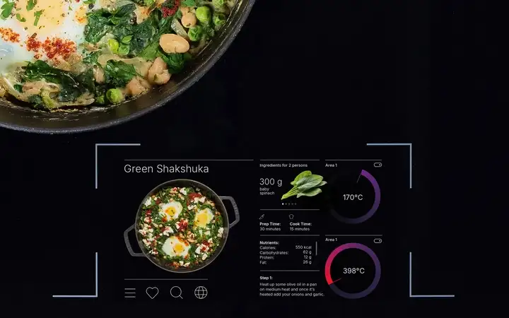 Close-up of a SCHOTT CERAN® Luminoir™ TFT cooktop showing a green shakshuka recipe and temperature displays. 