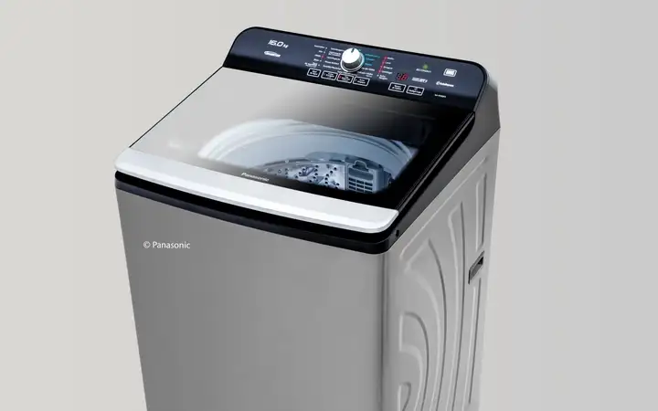 Home washing machine with a clear glass top panel