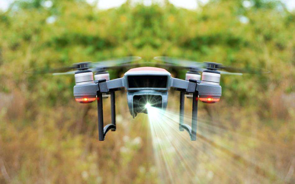 Airborne Lidar drone shining light