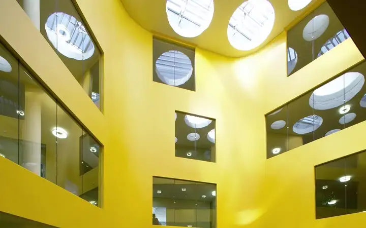 Interior of an office building glazed with fire-resistant glass of classification E