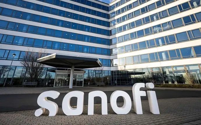 Sanofi company sign in front of the company building