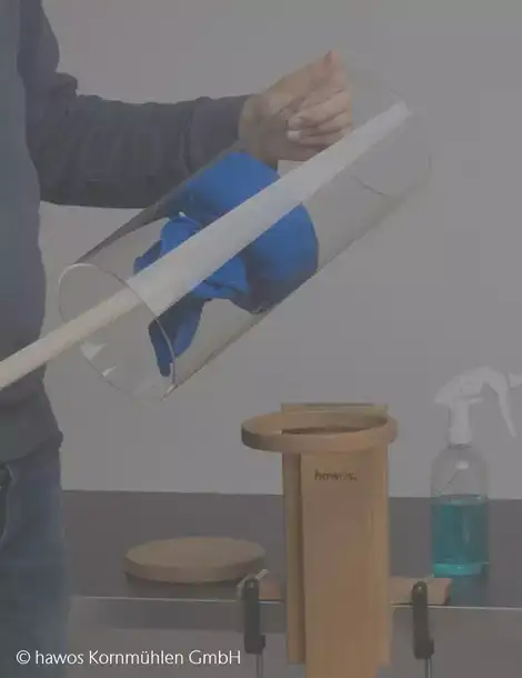 Man cleaning the inside of a DURAN® borosilicate glass tube