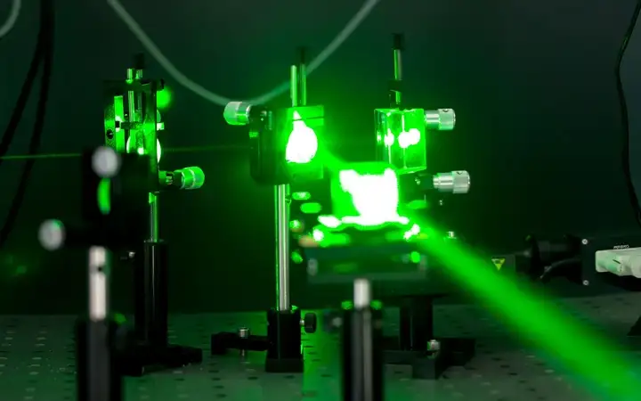 Laser equipment in a laboratory emitting green light