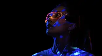 A woman wearing AR goggles