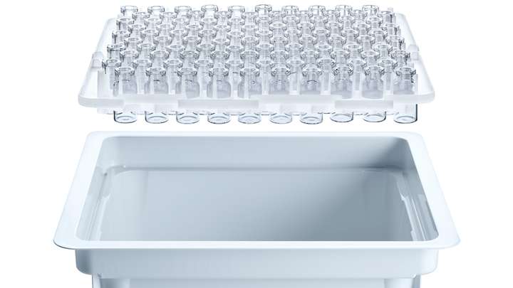 Nested glass vials over industry standard white tub