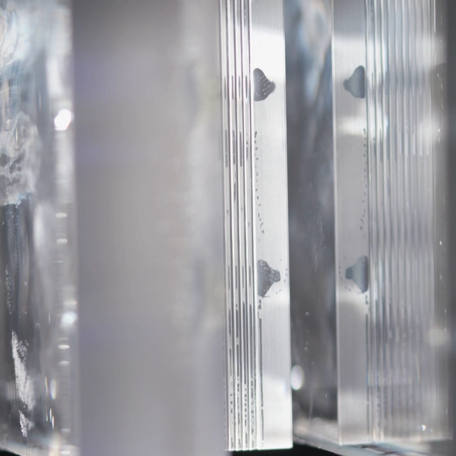 Waveguides are sliced into thin sheets during production.